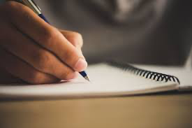 Writing in copy with pen