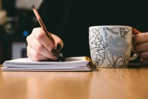 Holding Cup making notes