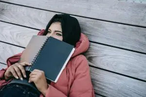 Girl thinking with copy in face