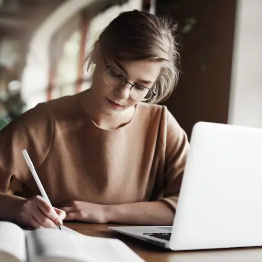 Girl writing in Copy