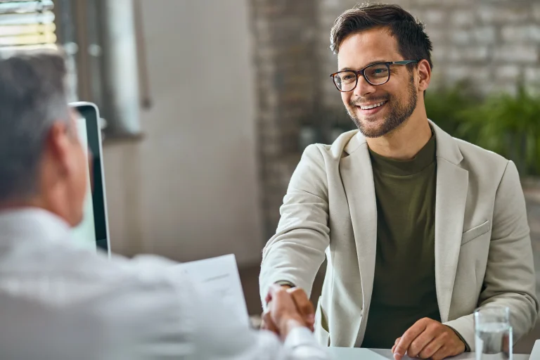 MBA applicant shaking hands during interview