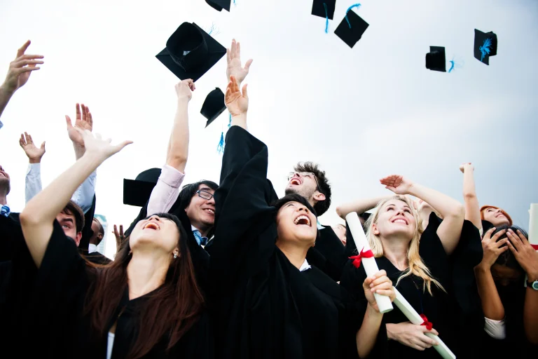 MBA students celebrating graduation