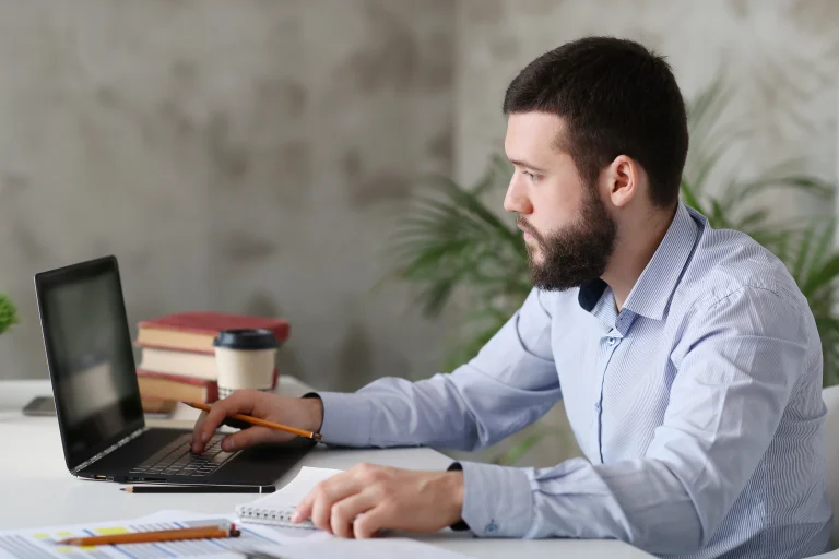 Professional studying MBA at his desk