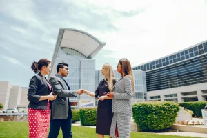 MBA students networking during a campus visit