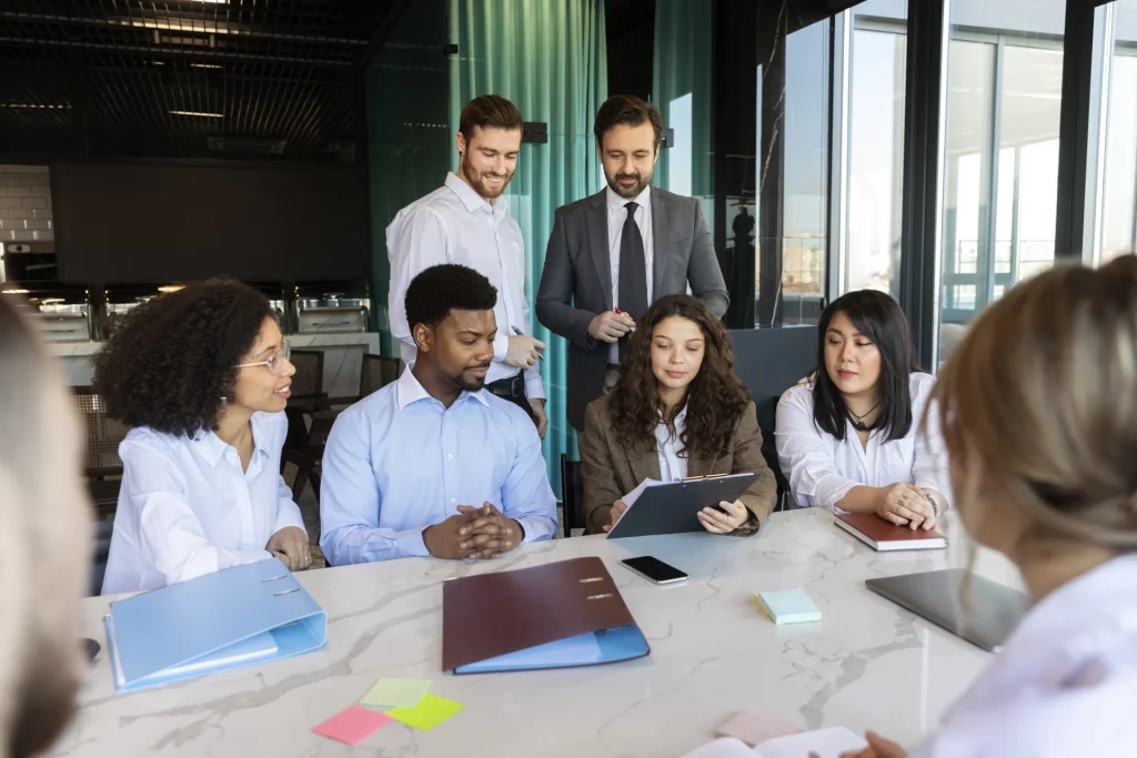 Diverse MBA students collaborating.