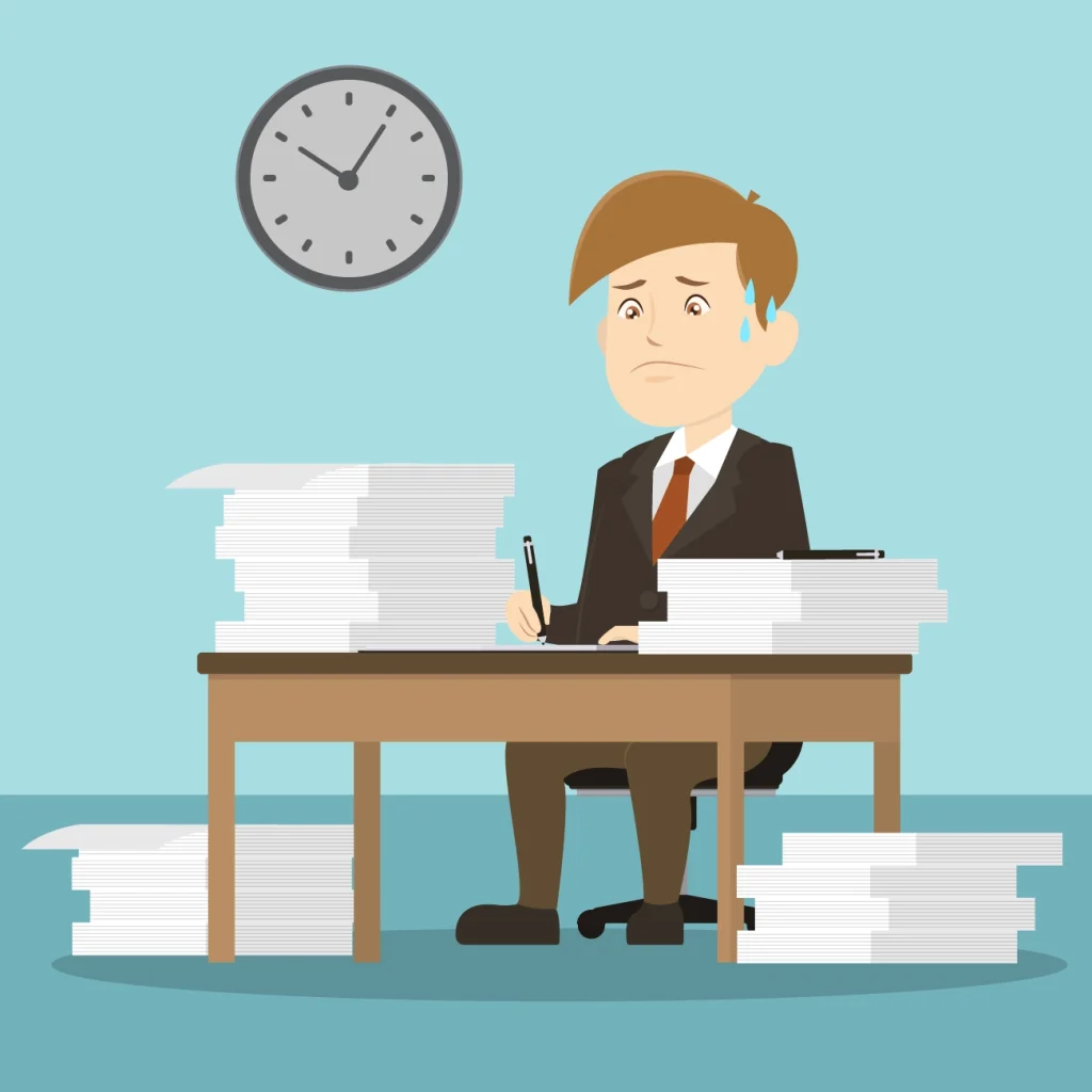 MBA Aspirant writing beside stack of application papers