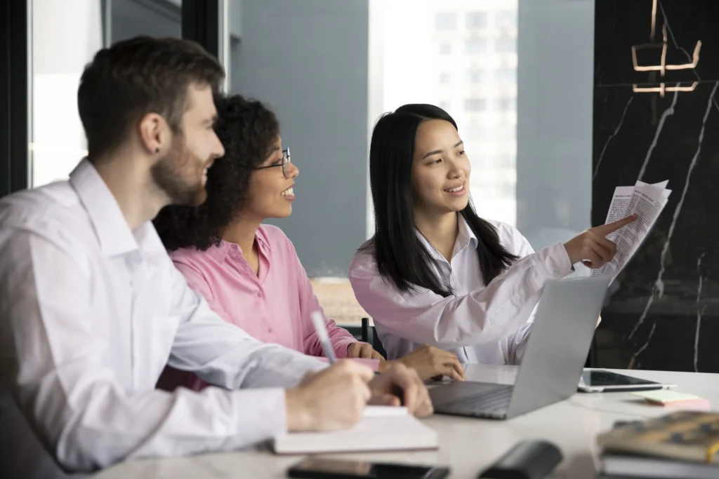 MBA graduates collaborating on a healthcare consulting project.